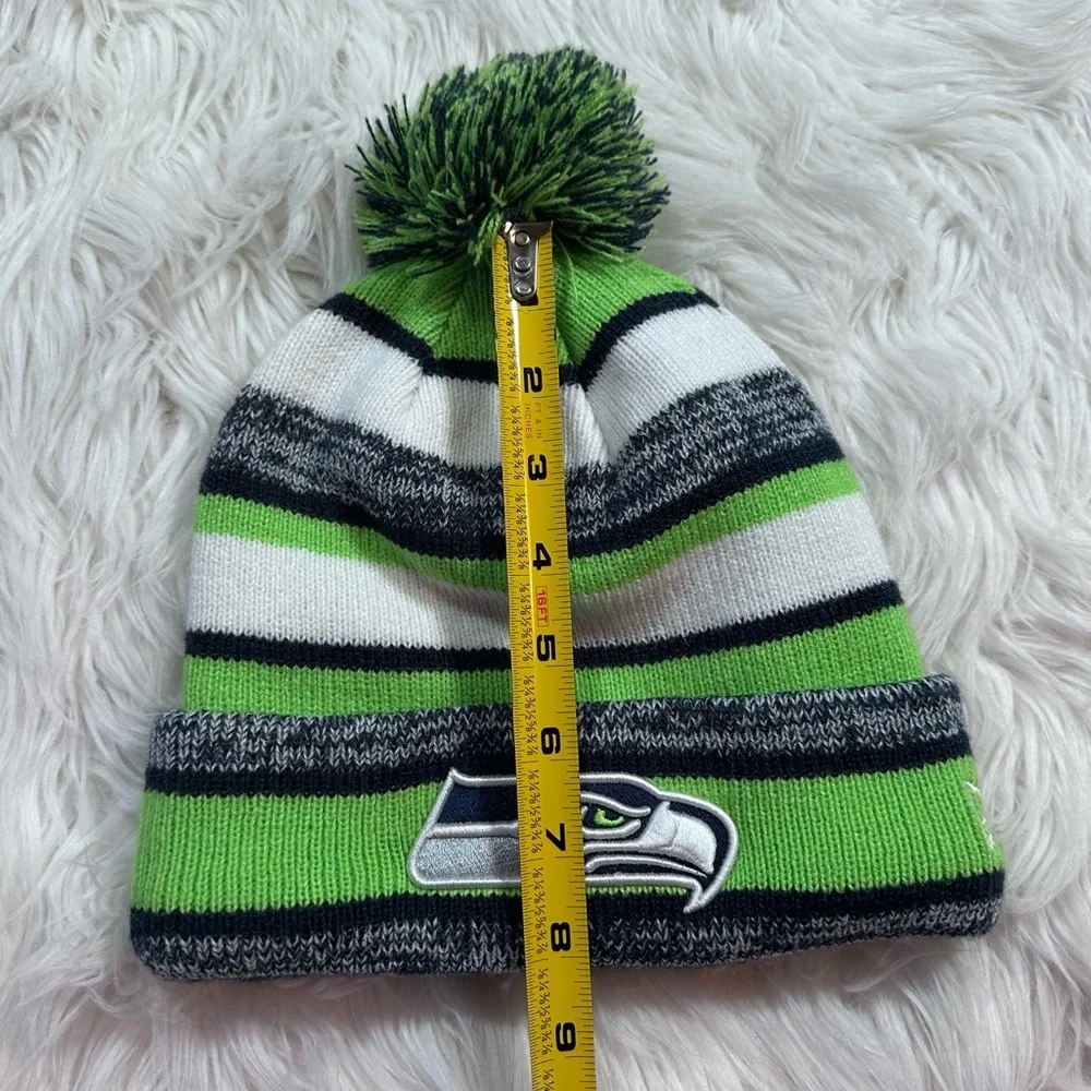 New Era • Official NFL Seattle Seahawks Striped Pom Pom Beanie - Picture 2 of 8